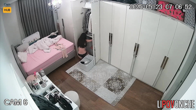 A seductive hottie changes her clothes in preparation for a date with her lover