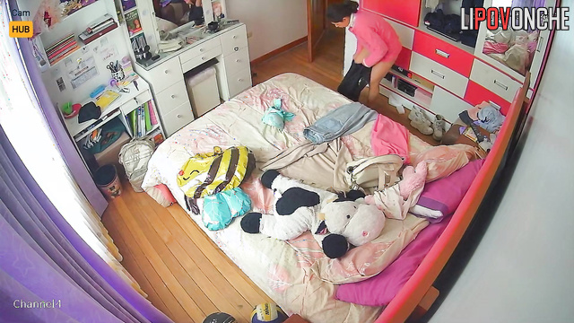 Petite brunette dressing in her room and she's in no hurry