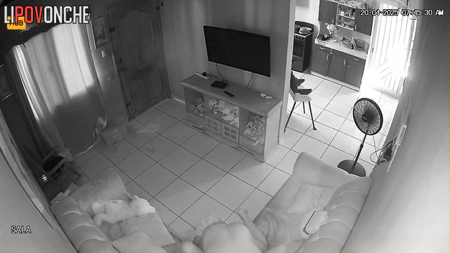 Bald and naked guy fucking his girl on a leather sofa