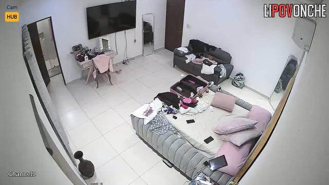 She put on some cream, washed her hair and is now watching a movie