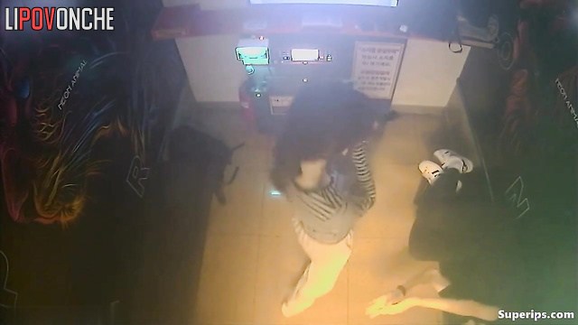 Young asian couple making dirty things in the karaoke club