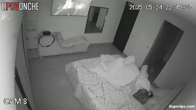 Couple kissing and enjoying each other under the blanket