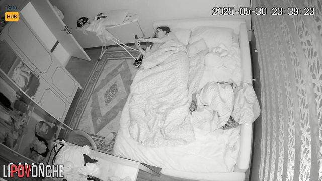 Lonely woman jumping under the blanket in the night