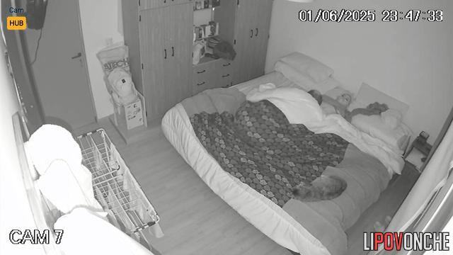 Naked people having sex with closed eyes, bedroom scene