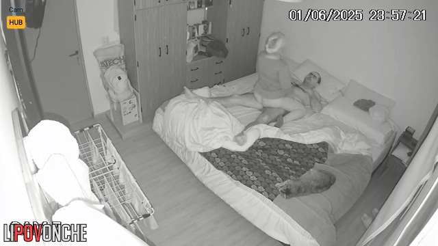 Naked people having sex with closed eyes, bedroom scene