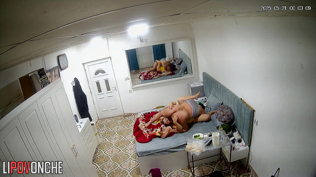 Bearded husband plays with tender nipples of his chubby wife
