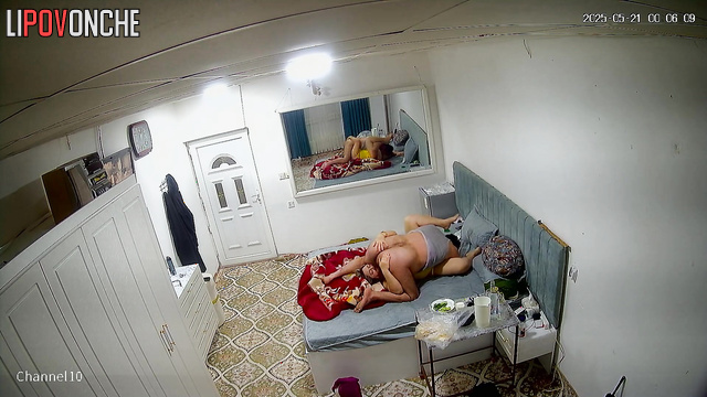 Bearded husband plays with tender nipples of his chubby wife