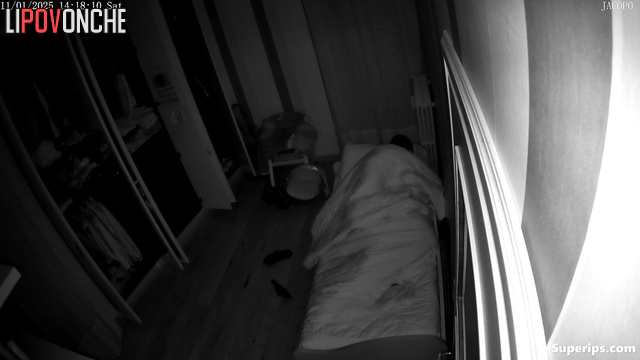 A young couple relaxes between sessions of passionate sex on a narrow bed