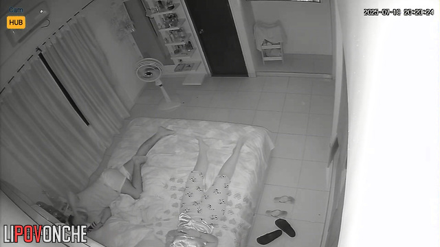 Couple enjoying a sudden passion on fresh sheets, home tape