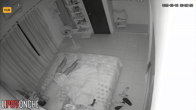 Couple enjoying a sudden passion on fresh sheets, home tape