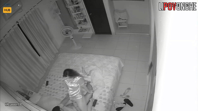 Couple enjoying a sudden passion on fresh sheets, home tape