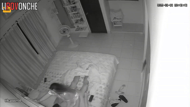 Couple enjoying a sudden passion on fresh sheets, home tape