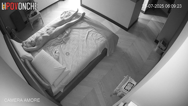 Naked milf making exercises in her bed (solo spy cam)