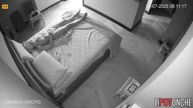 Naked milf making exercises in her bed (solo spy cam)