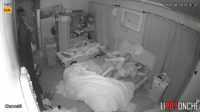 Old fart kissing a tattooed whore under the blanket
