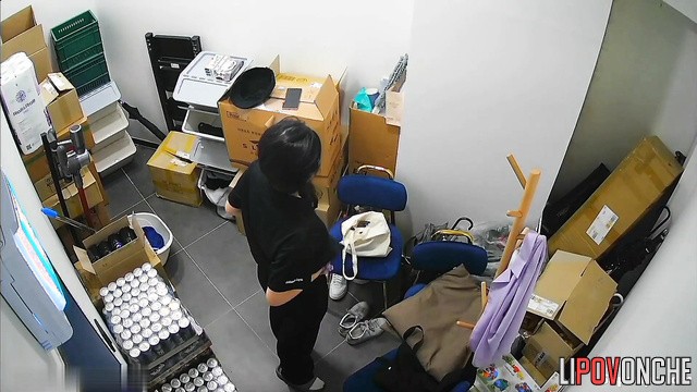 Young Korean women change into uniforms in a small office room