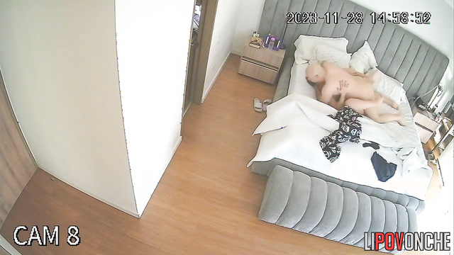 The husband lay down on the bed to rest, but his wife sat on his face