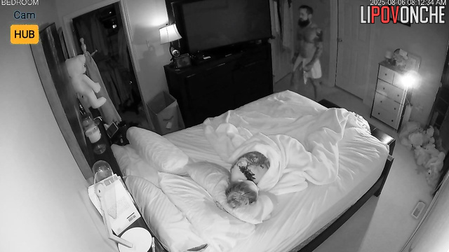 Tattooed couple kissed and fucked in bed, unaware their joy is being filmed