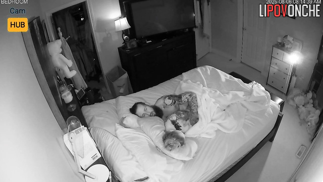Tattooed couple kissed and fucked in bed, unaware their joy is being filmed