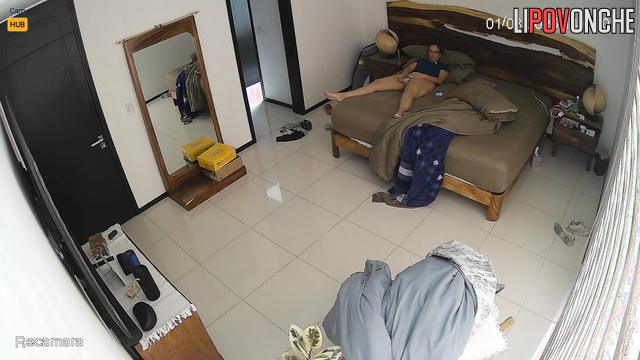 Lady relaxing alone, not realizing neighbor observes her