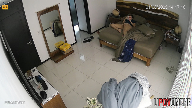 Lady relaxing alone, not realizing neighbor observes her