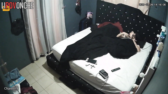 People relax in bed, not realizing someone observes them