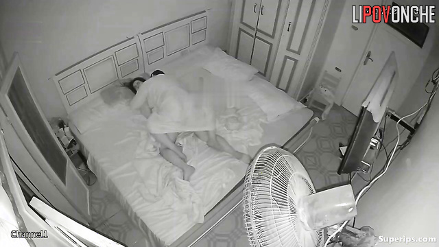 Couple enjoys each other, unaware their moments are filmed