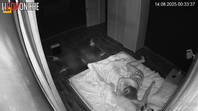 This naked couple fucking, unaware of the hidden camera, look