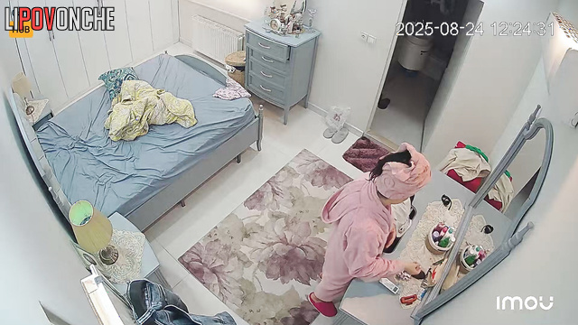 Topless brunete is not alone in her bedroom, look