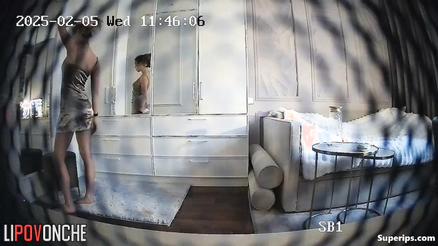 Young blonde dancing and dressing at the same time