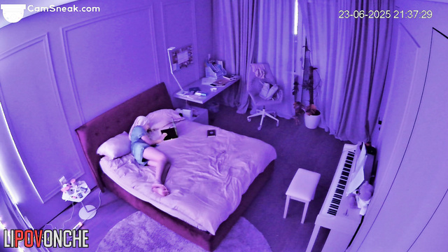 Excited by watching porn, a young student plays with her hairy pussy