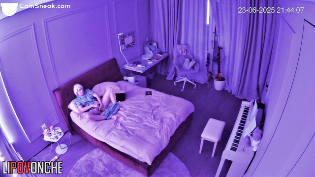 Excited by watching porn, a young student plays with her hairy pussy