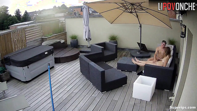 A seductive beauty with small tits loves to play with her husband's cock outdoors