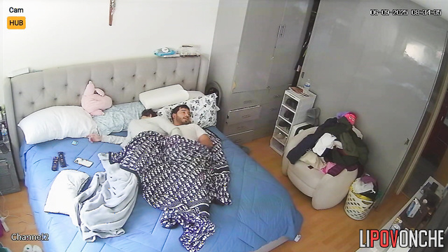 A chubby Mexican woman actively lifts her bored husband's penis