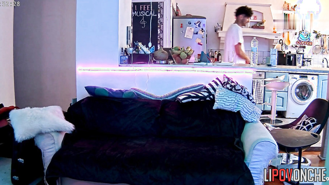 Brunet and blonde enjoying each other on the cozy sofa