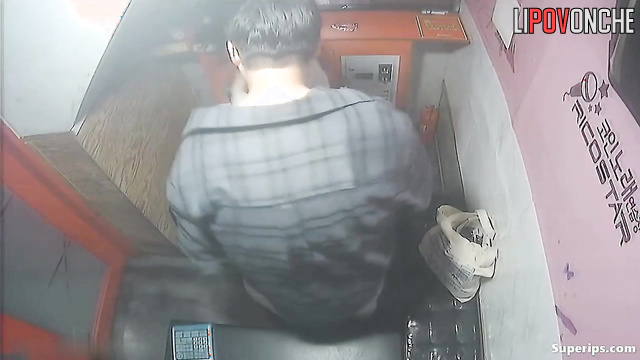 Asian teens teasing each other at a karaoke club, look