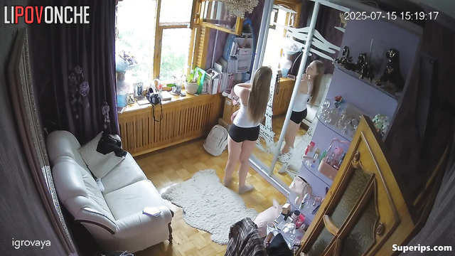 Beauty enjoys looking at herself in the big mirror