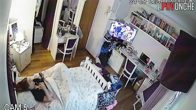Girl enjoying herself and doesn't suspect that someone is peeping