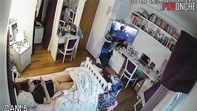 Girl enjoying herself and doesn't suspect that someone is peeping