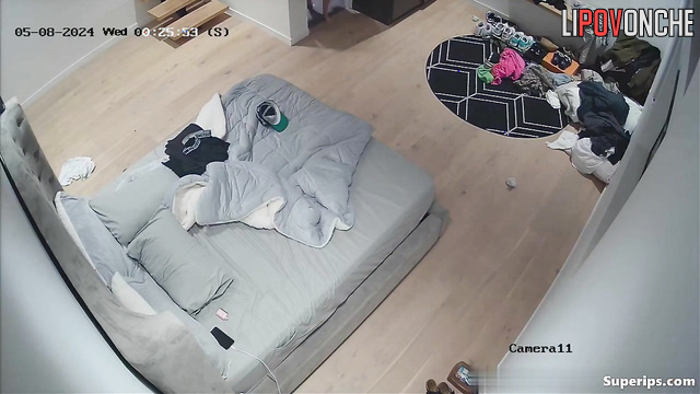 Tattooed couple fucking in the bedroom, unaware of a watcher nearby