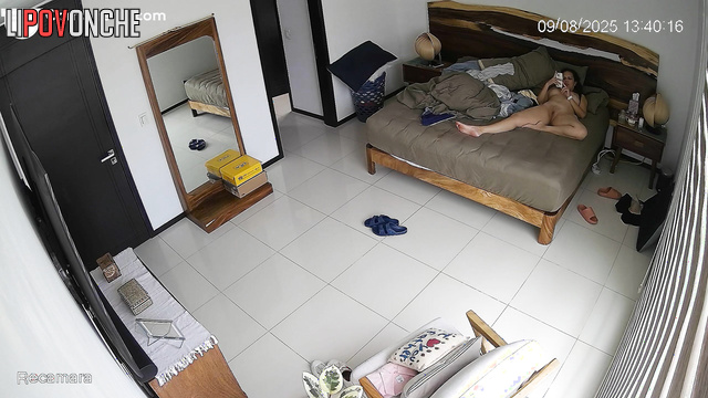 Lady with big ass lying on the bed and talking to her husband