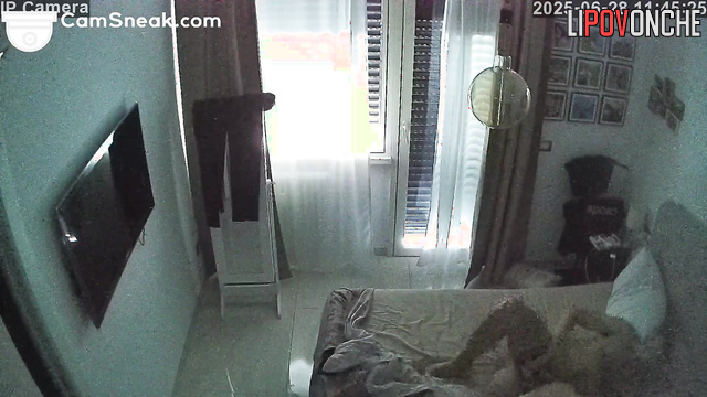Someone watches this couple as she enjoys their gentle morning