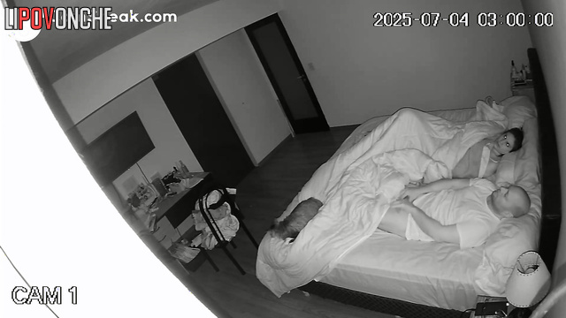 A secret person watches the spouses as she enjoys the cool night