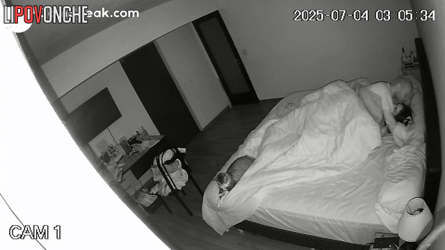A secret person watches the spouses as she enjoys the cool night