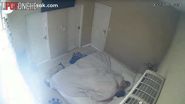 Someone concealed monitors the spouses as they fucked