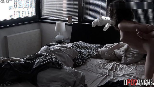 An unknown watcher quietly follows the couple in the bedroom