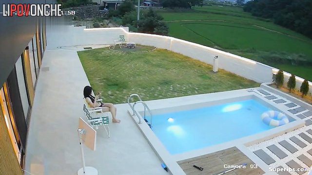 Asian couple chilling together in pool (they had hard working day)