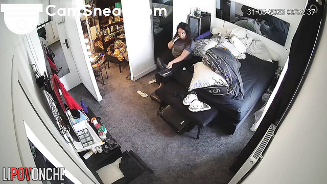 Juicy brunette with big ass and boobs getting ready for a meeting