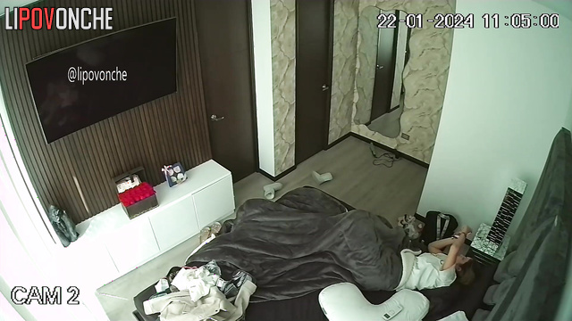 Brunette used a vibrator while lying on the bed and enjoyed it