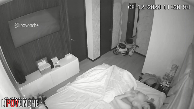 Big-breasted girl bouncing on her lover's cock in a bedroom